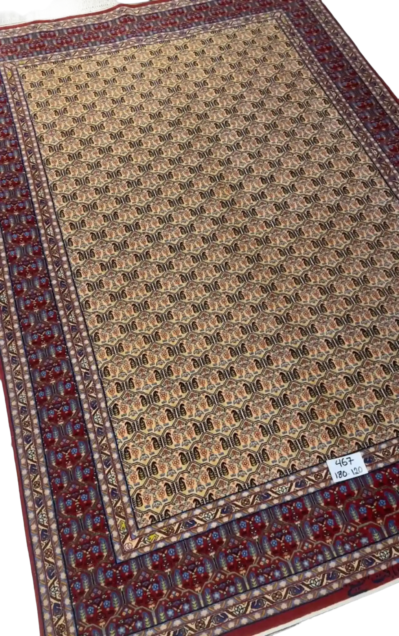 "Hand-knotted Isfahan rug with geometric designs, wool and silk pile"